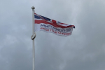 Pictured, the Armed Forces flag raising ceremony at Princes Gardens, Aldershot