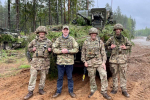 Leo with Service Personnel of the British Army