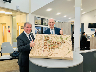  Leo and Rushmoor Borough Council Leader Cllr David Clifford looking at plans for the new Farnborough Leisure and Civic Hub